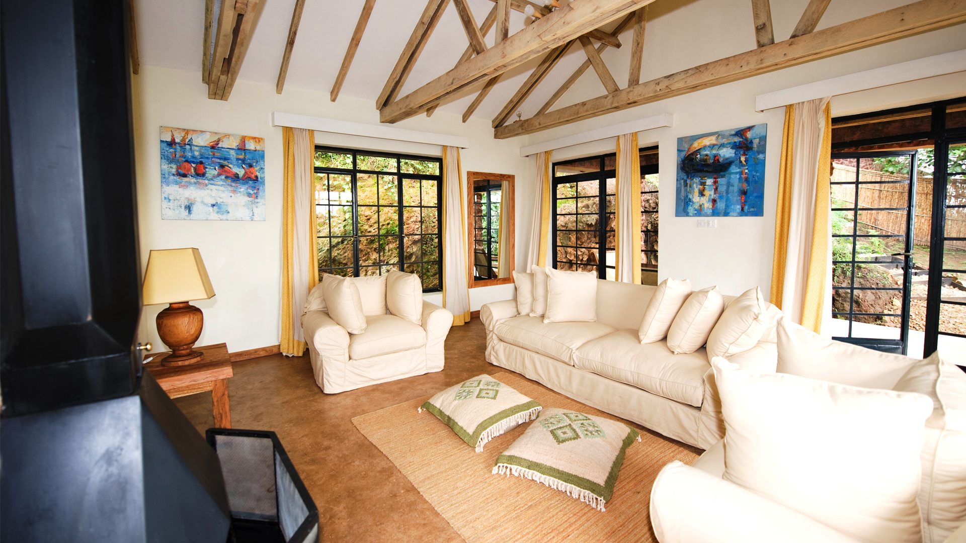 Guest Area with Blazing fireplace at Clouds Mountain Gorilla Lodge bwindi